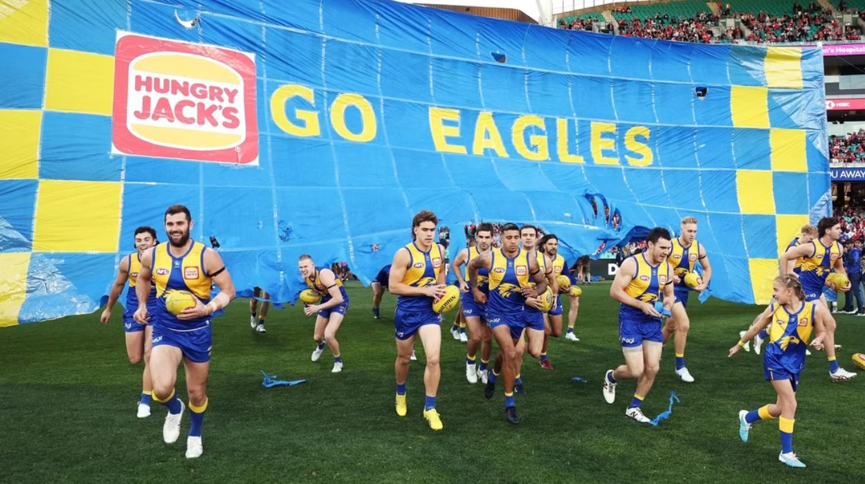 Eagles banner to be pre-torn in half to prevent risk of a player injuring themselves on the crêpe paper